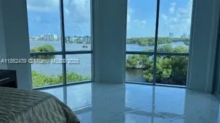 a bedroom with window