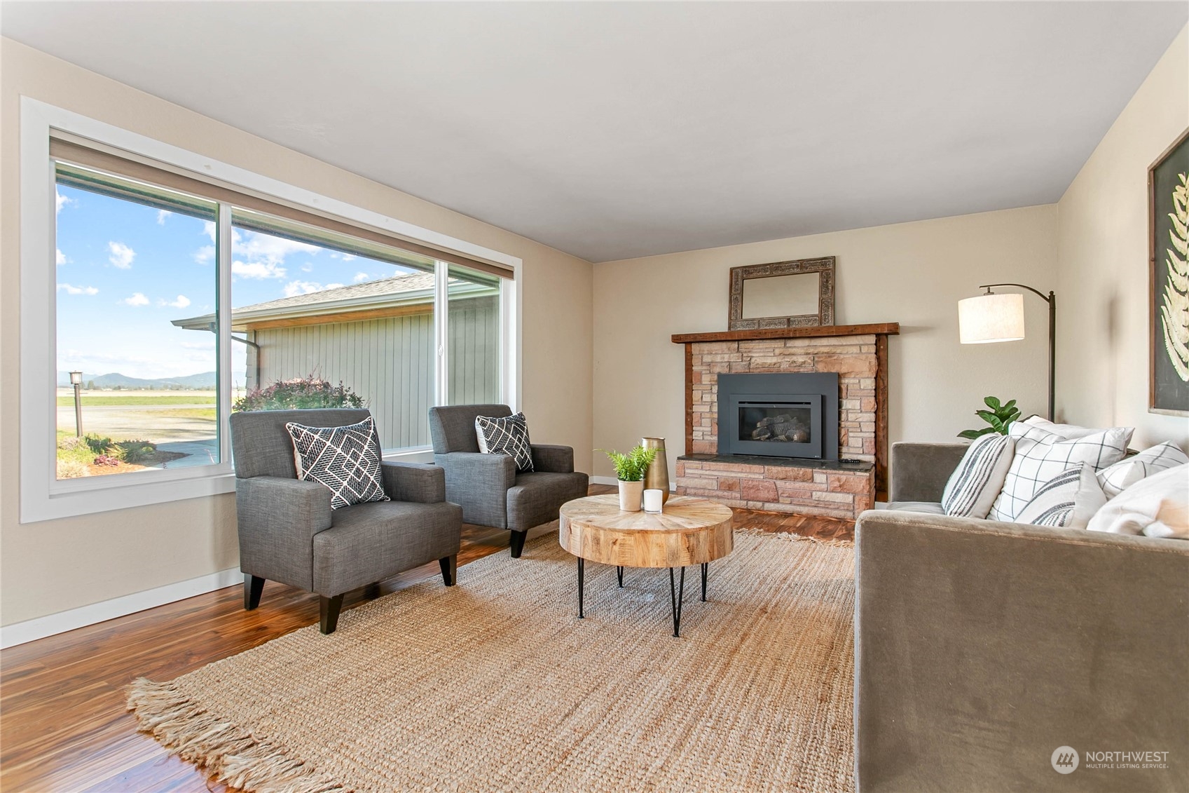 14486 Laconner Whitney Road La Conner, WA 98257 - Photo 3 of 40 a living room with furniture and a fireplace