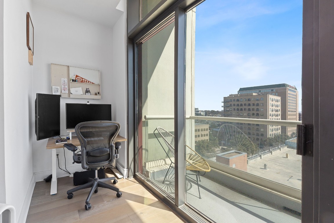 555 East 5th Street, Unit 817 Austin, TX 78701 - Photo 12 of 39 a view of a workspace with furniture and a window