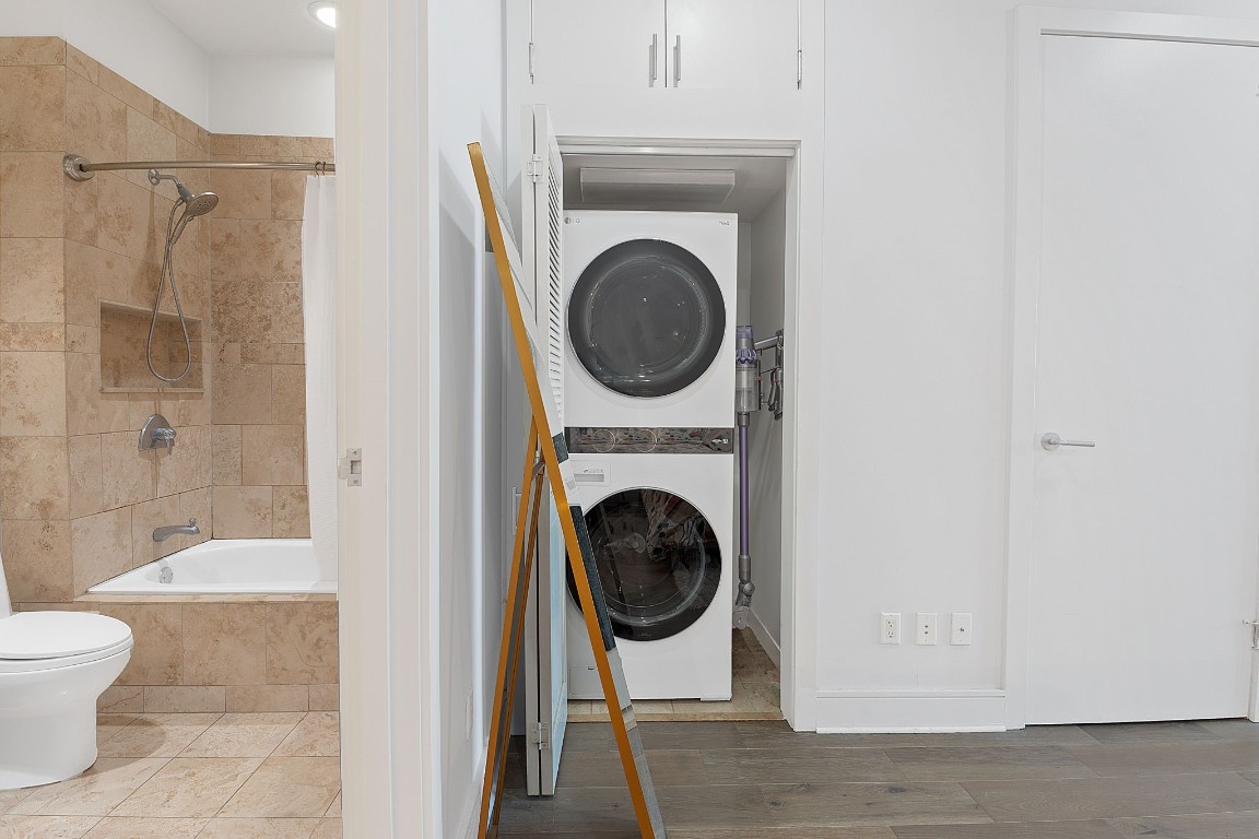 555 East 5th Street, Unit 817 Austin, TX 78701 - Photo 24 of 39 a bathroom with a sink a toilet and shower