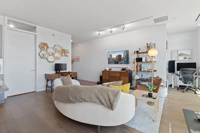 a kitchen with stainless steel appliances a refrigerator sink and cabinets