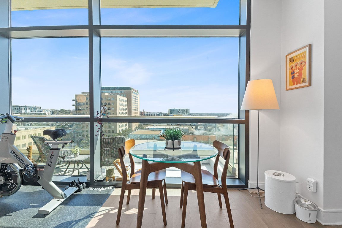 555 East 5th Street, Unit 817 Austin, TX 78701 - Photo 9 of 39 a view of a dining room with furniture and a window