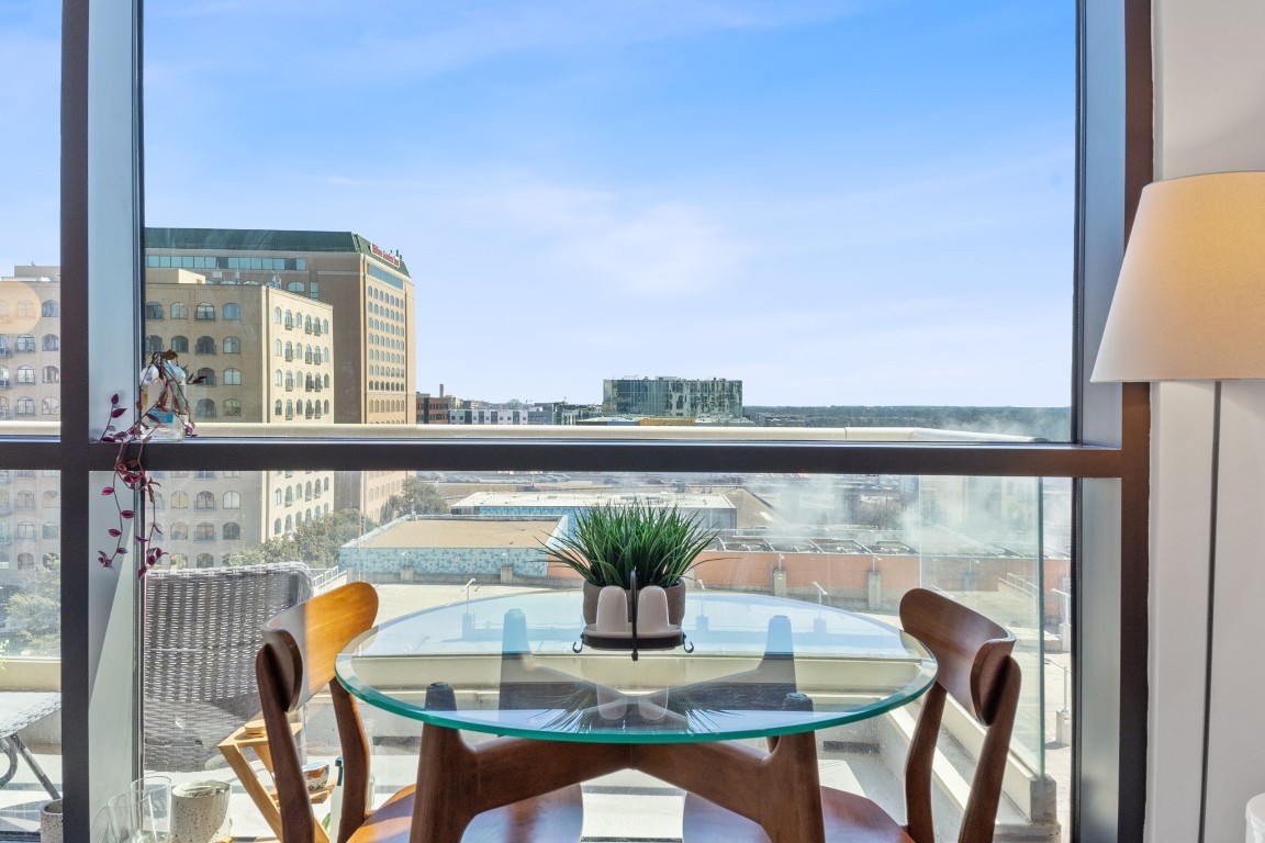 555 East 5th Street, Unit 817 Austin, TX 78701 - Photo 10 of 39 a view of a dining room with furniture window and outside view
