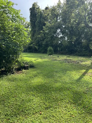 a view of outdoor space and a lake view
