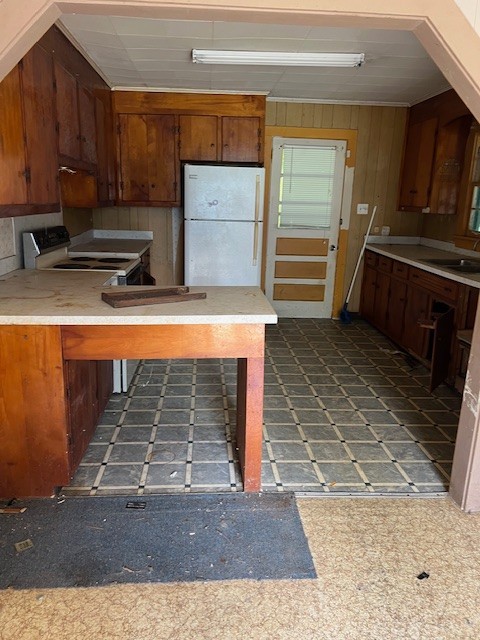 512 Main Street Baxter, TN 38544 - Photo 3 of 24 a kitchen with kitchen island a sink stainless steel appliances and cabinets