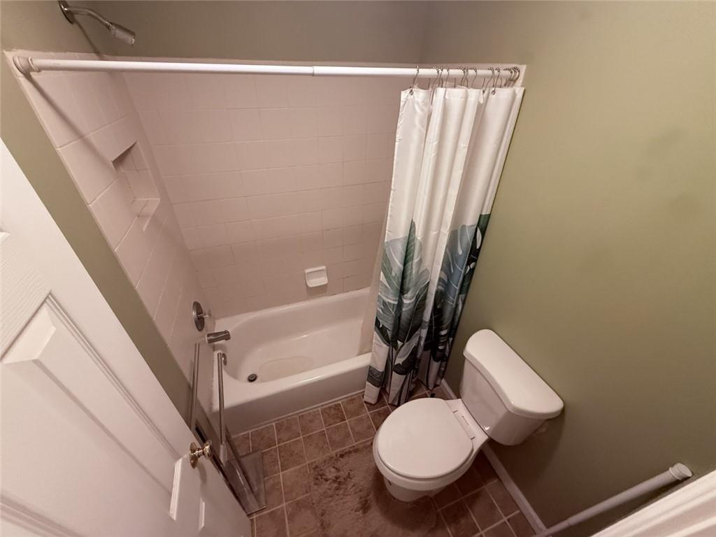5730 Devonshire Way Cumming, GA 30040 - Photo 21 of 55 a white toilet sitting next to a sink
