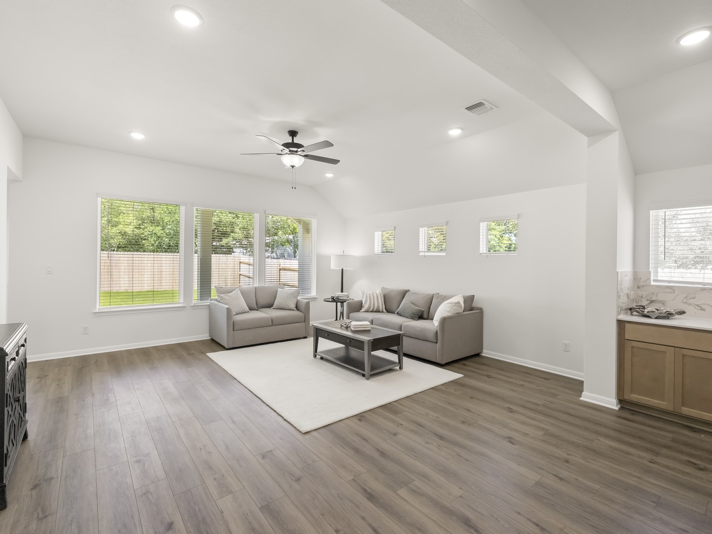 402 Judson Street Bertram, TX 78605 - Photo 9 of 27 a living room with furniture and a large window