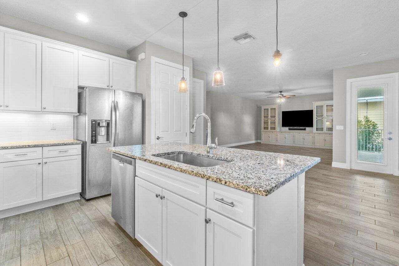 1127 Dakota Drive Jupiter, FL 33458 - Photo 6 of 36 013-1127DakotaDrive-Jupiter-FL-33458-SMA