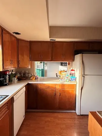 a bed room with furniture and window