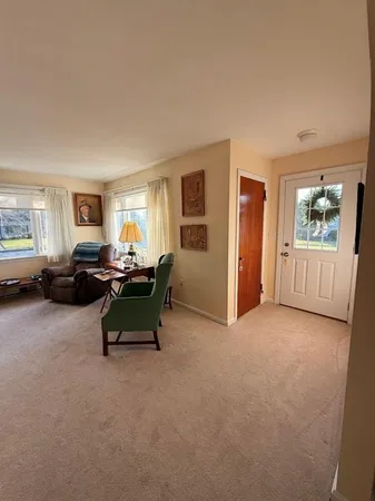 a view of an empty room with a window