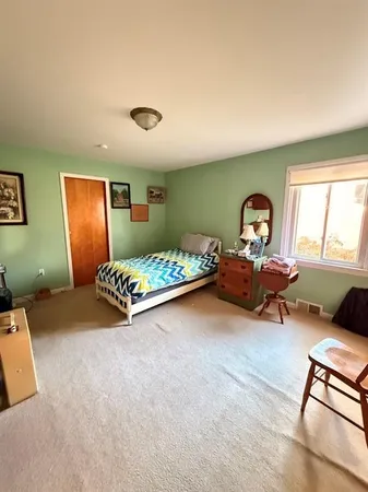 a view of a hallway with front door