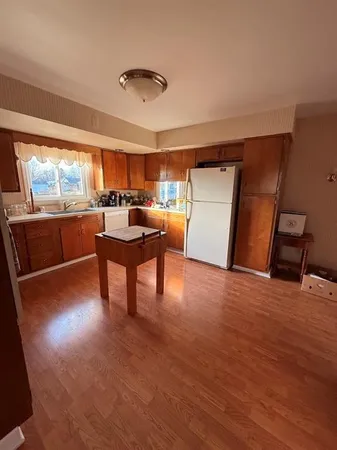 a view of a yard with a tree