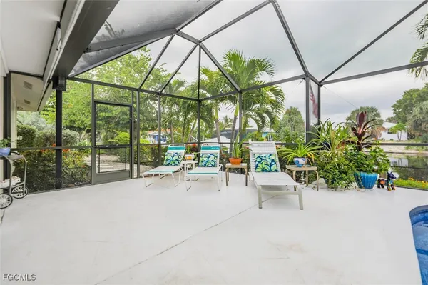 a view of yard with porch and patio