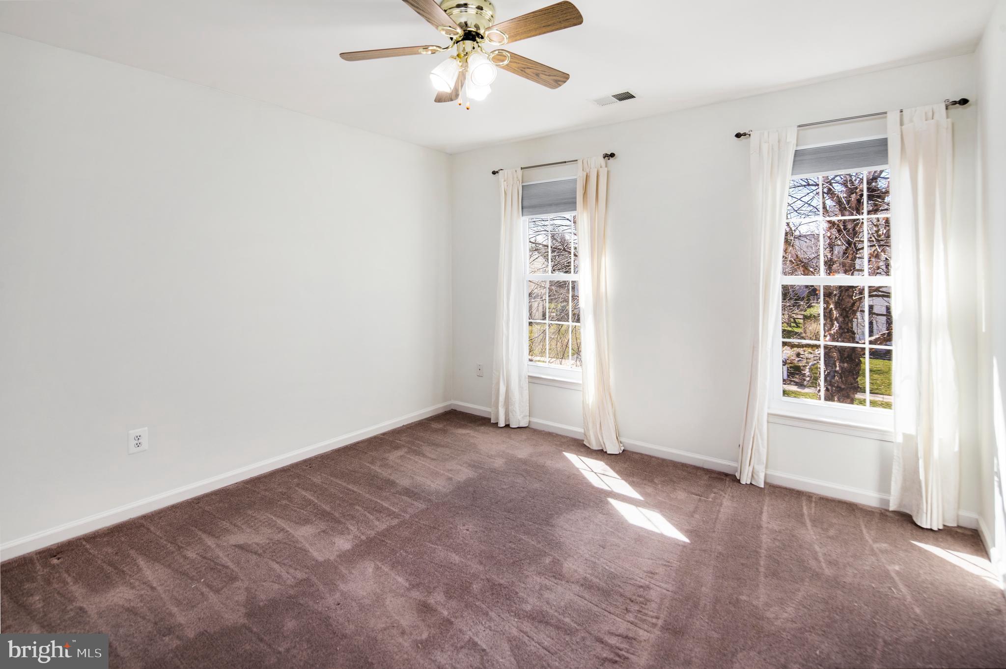 1723 Castle Rock Road Frederick, MD 21701 - Photo 22 of 49 Bedroom 3, with ceiling fan and closet organizer.