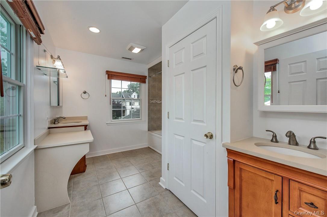 74 Dearborn Avenue Rye, NY 10580 - Photo 11 of 17 Primary Bath with double vanities and water closet