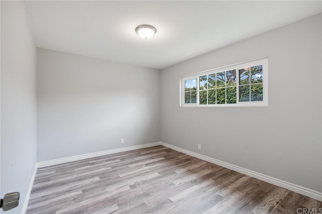 19309 Belshaw Avenue Carson, CA 90746 - Photo 23 of 40 an empty room with a window