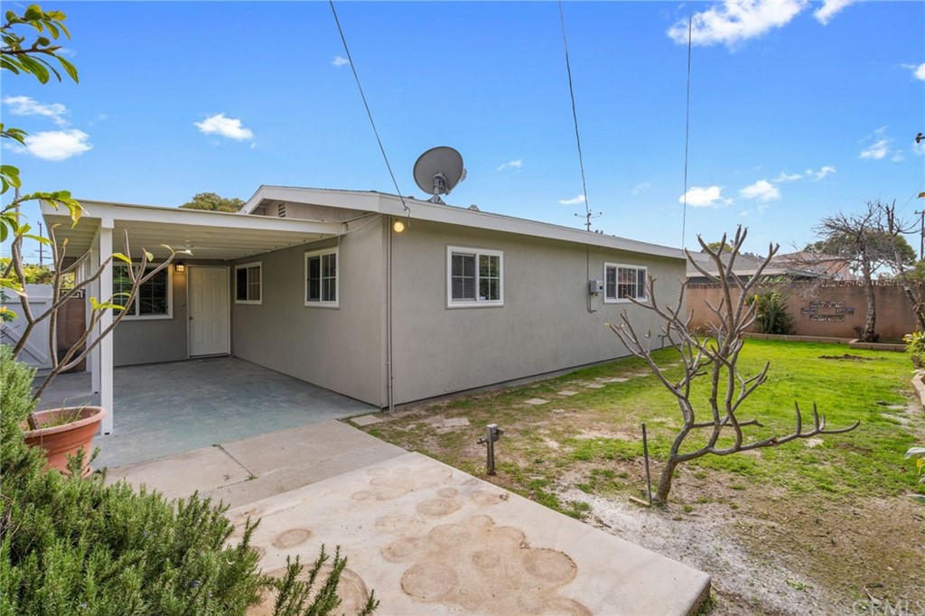 19309 Belshaw Avenue Carson, CA 90746 - Photo 27 of 40 a view of a house with backyard