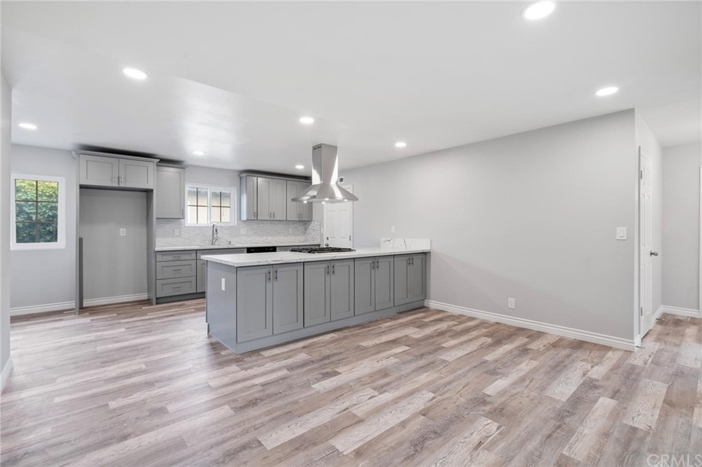 19309 Belshaw Avenue Carson, CA 90746 - Photo 9 of 40 a view of kitchen with wooden floor