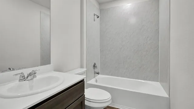 a view of kitchen with wooden floor and electronic appliances