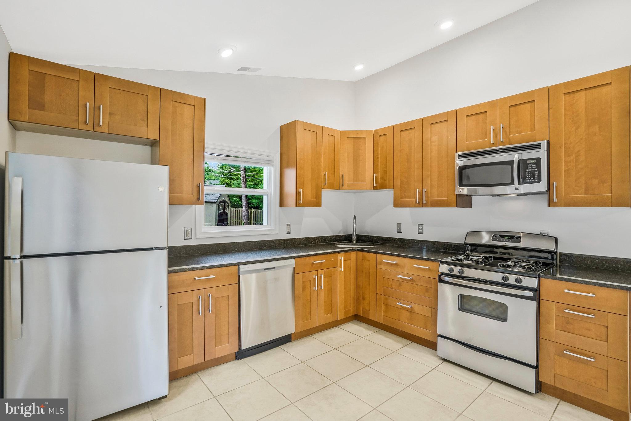 6023 Rixey Drive Alexandria, VA 22303 - Photo 11 of 44 SS appliances and stone counters