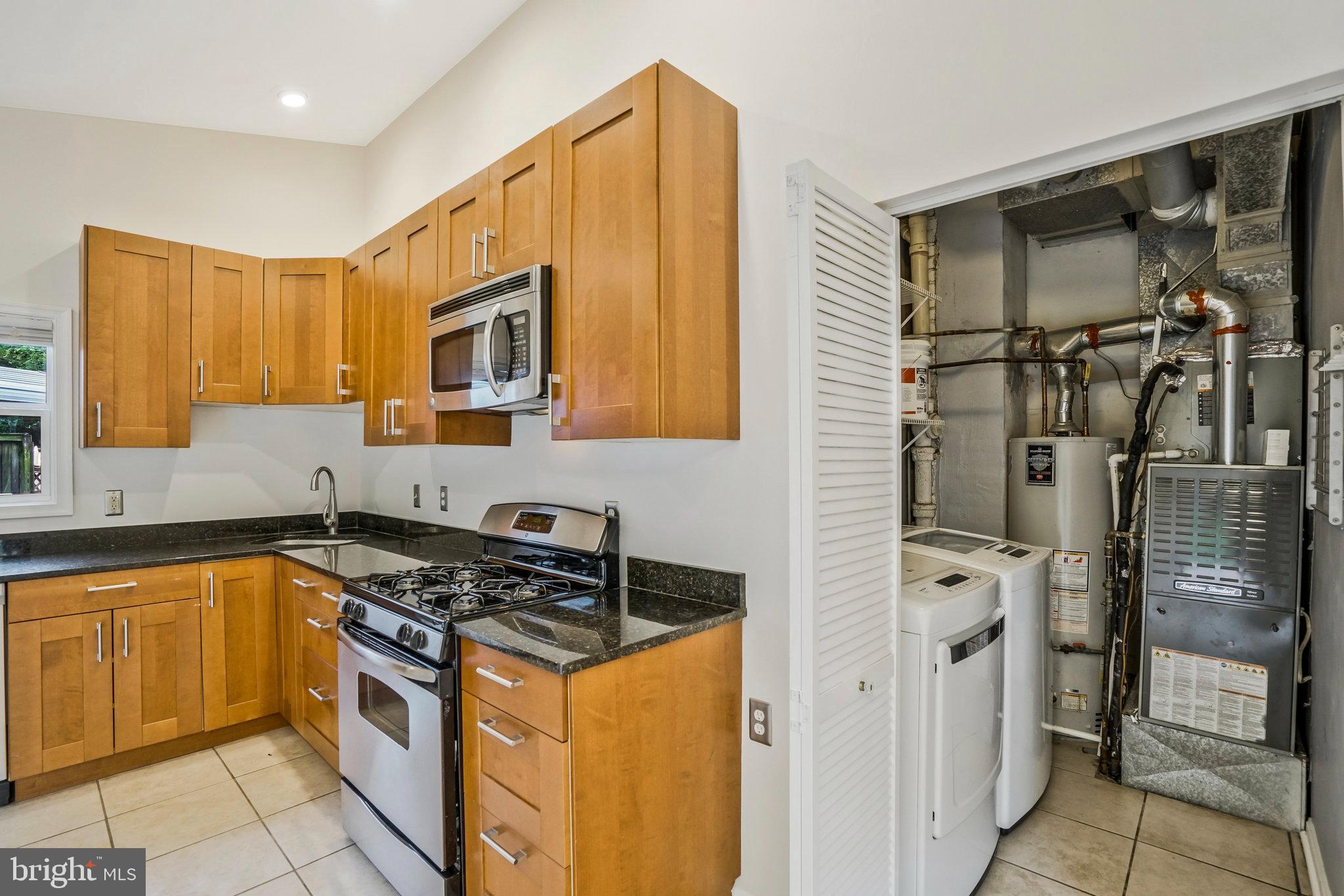 6023 Rixey Drive Alexandria, VA 22303 - Photo 13 of 44 Laundry/utility room off the kitchen
