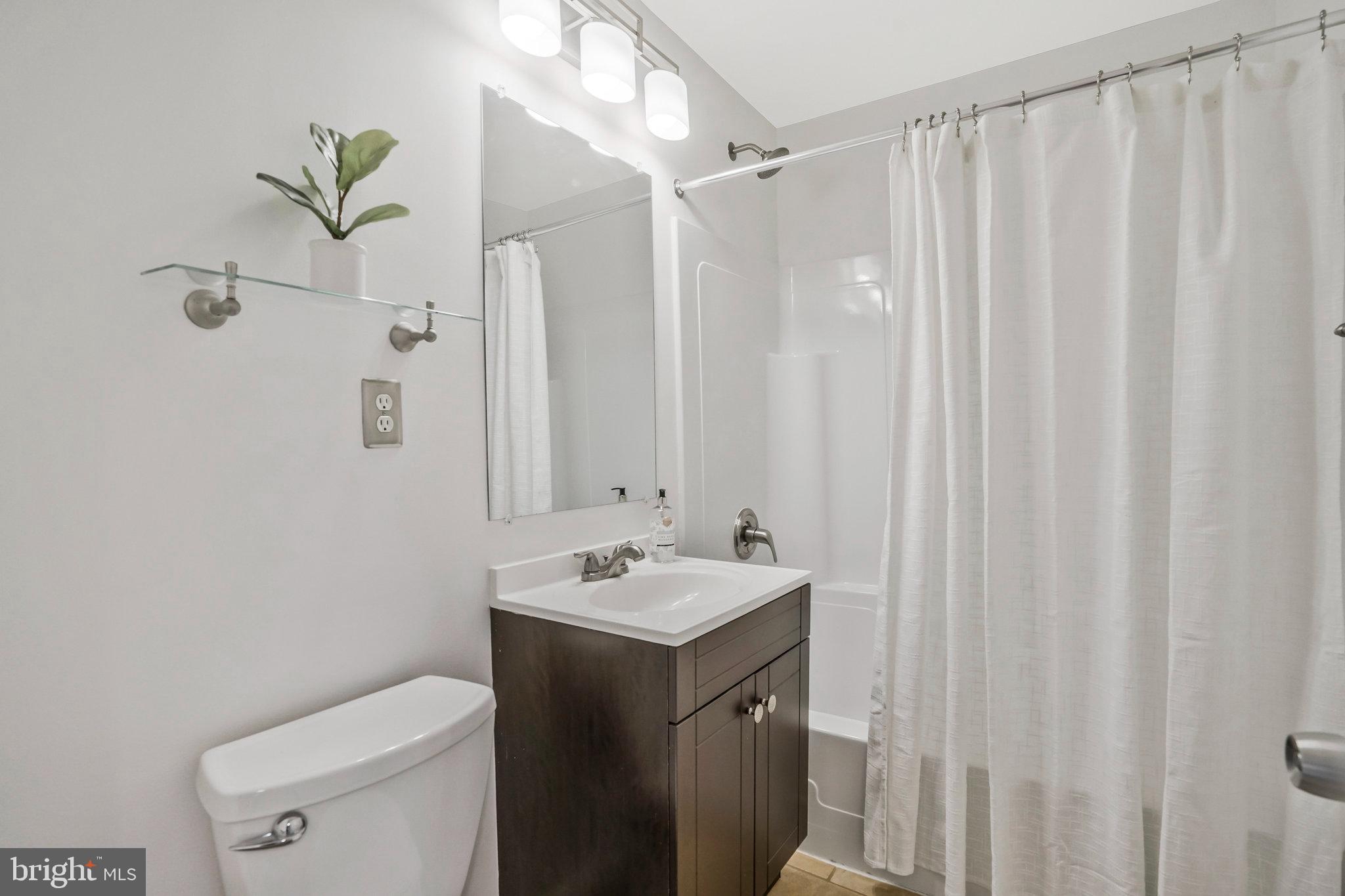 6023 Rixey Drive Alexandria, VA 22303 - Photo 16 of 44 Main level bathroom