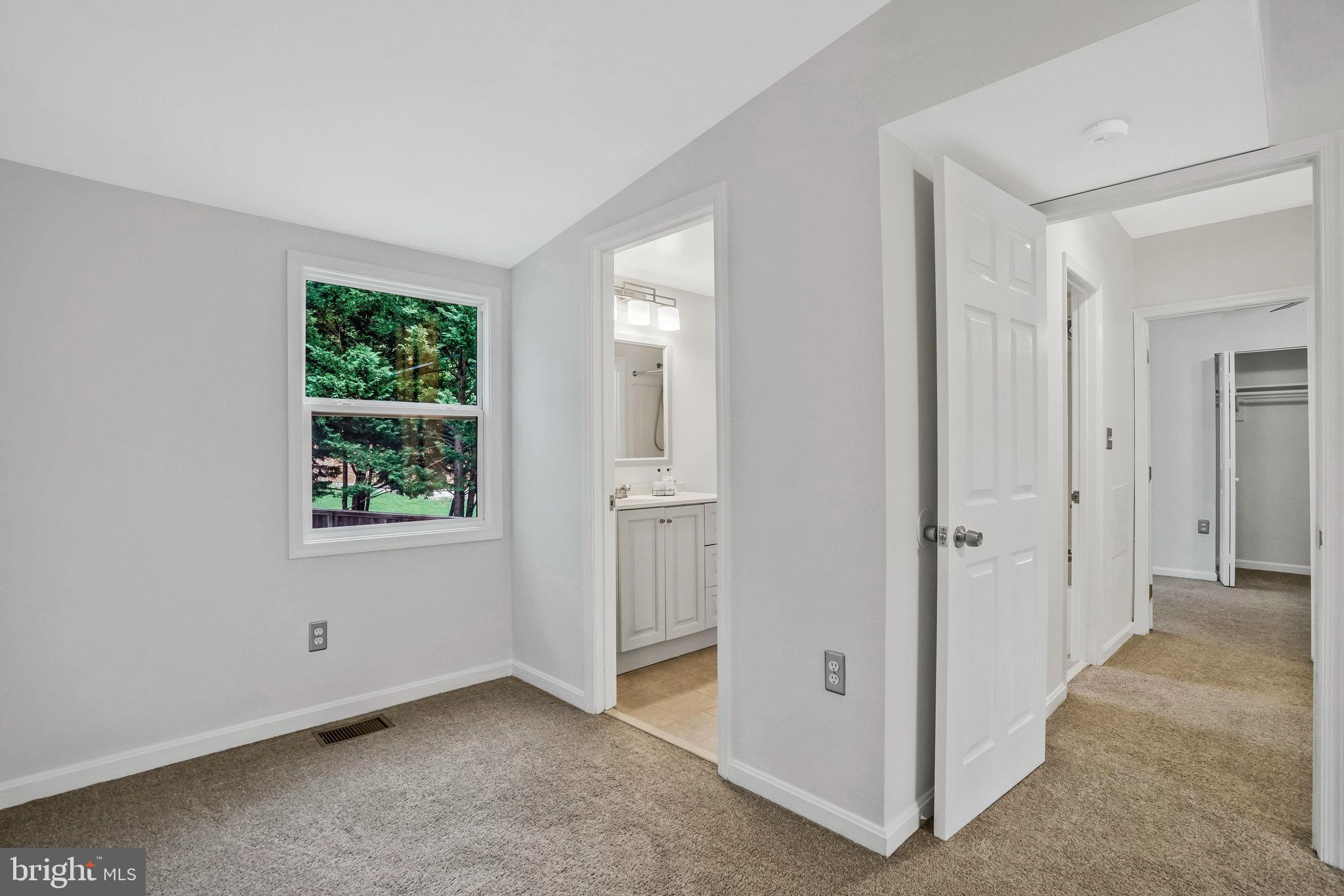 6023 Rixey Drive Alexandria, VA 22303 - Photo 22 of 44 Upper level primary bedroom