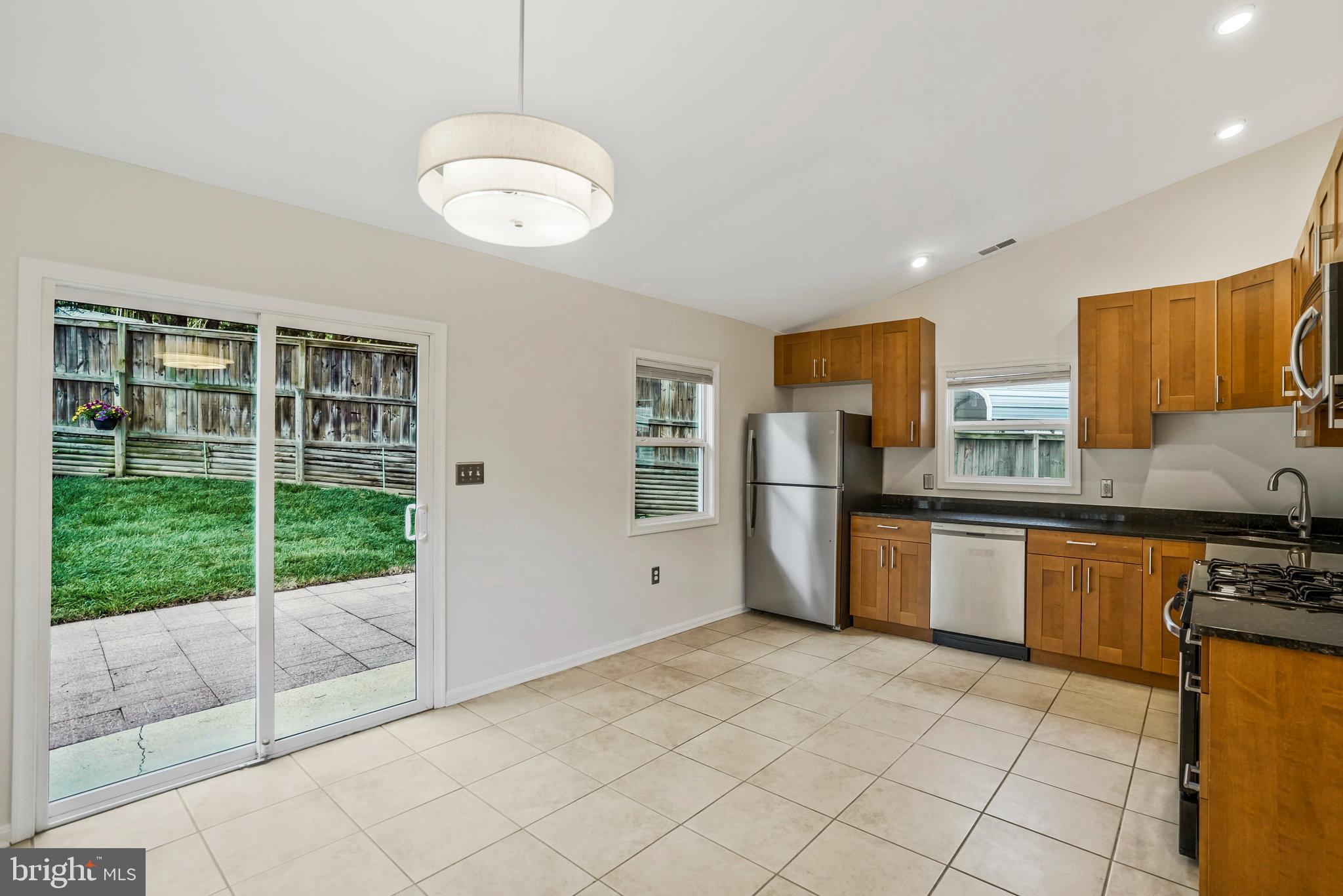 6023 Rixey Drive Alexandria, VA 22303 - Photo 9 of 44 Vaulted kitchen ceilings - look up!
