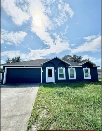 front view of a house with yard