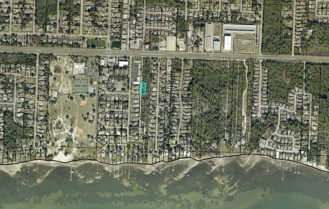 a brick building with a sign on it