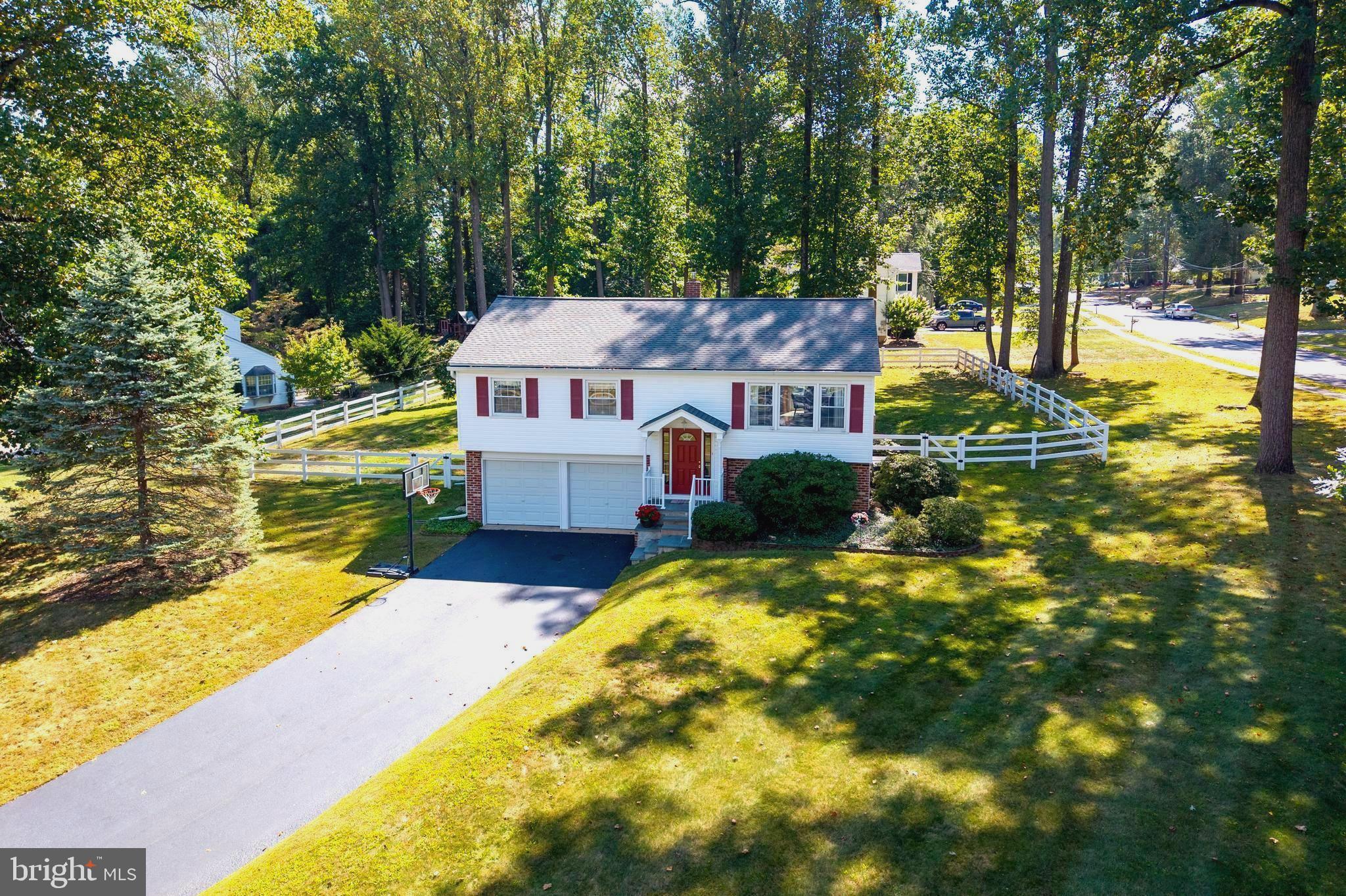 402 Concord Avenue Exton, PA 19341 - Photo 1 of 39 a view of house with swimming pool and trees in the background