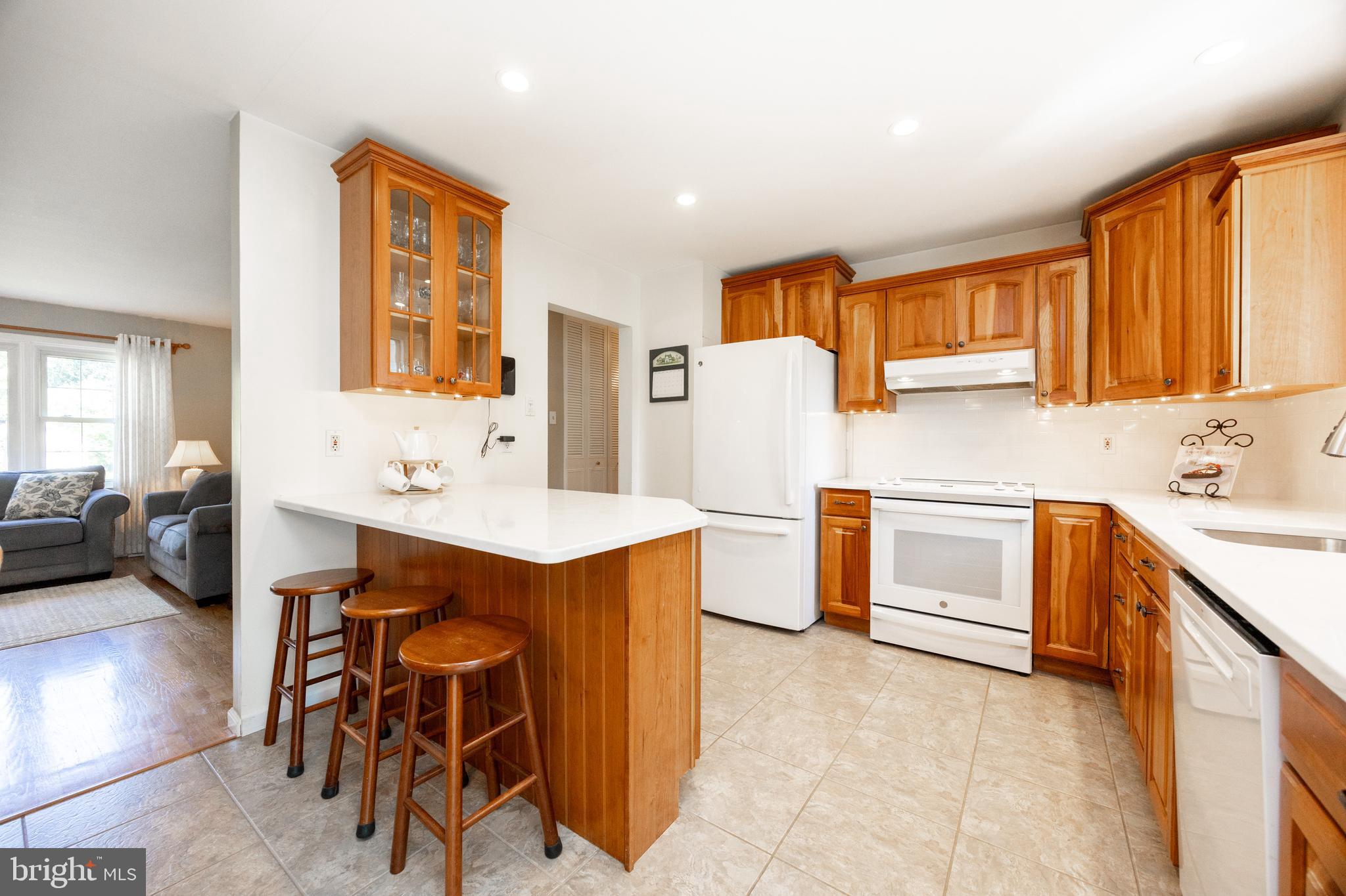 402 Concord Avenue Exton, PA 19341 - Photo 14 of 39 a kitchen with a sink a stove and chairs