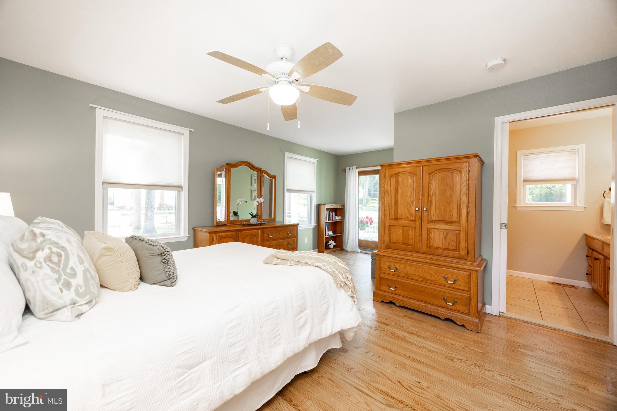 402 Concord Avenue Exton, PA 19341 - Photo 19 of 39 a bedroom with a bed and wooden floor
