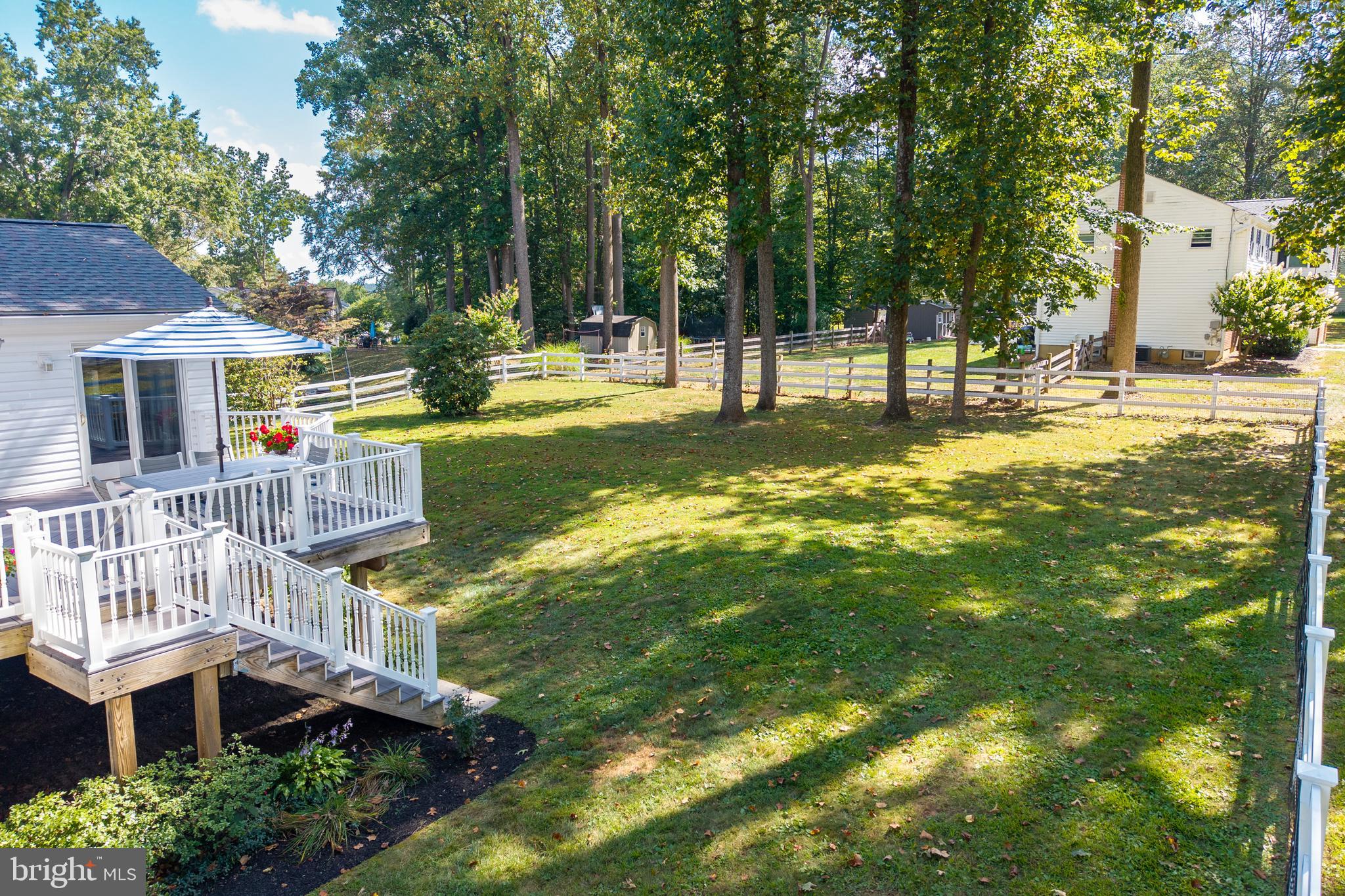 402 Concord Avenue Exton, PA 19341 - Photo 2 of 39 a view of swimming pool with lawn chairs and plants