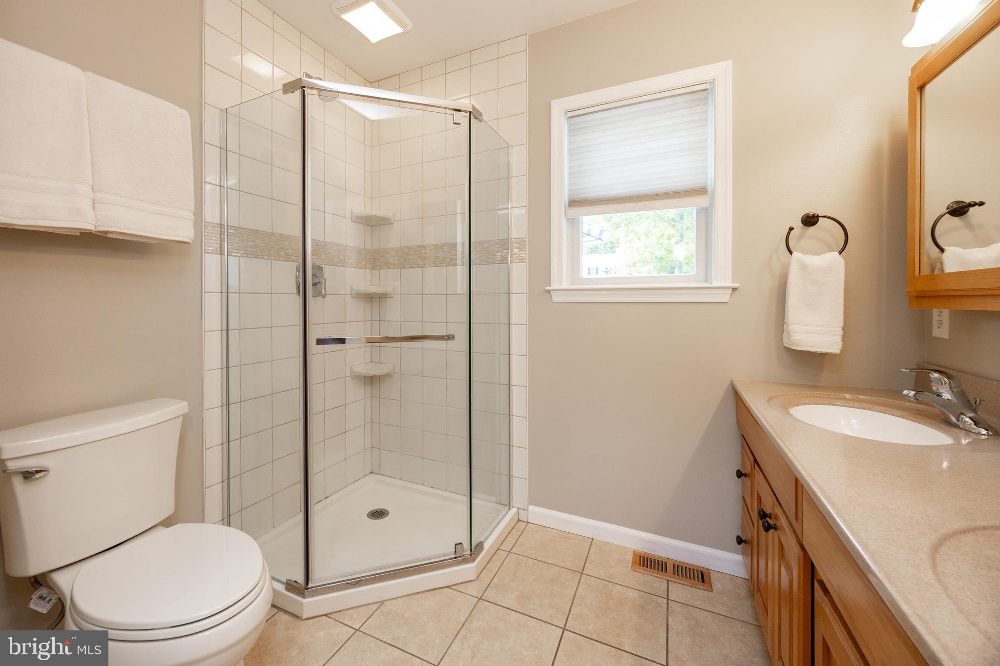 402 Concord Avenue Exton, PA 19341 - Photo 21 of 39 a bathroom with a shower a toilet and a sink