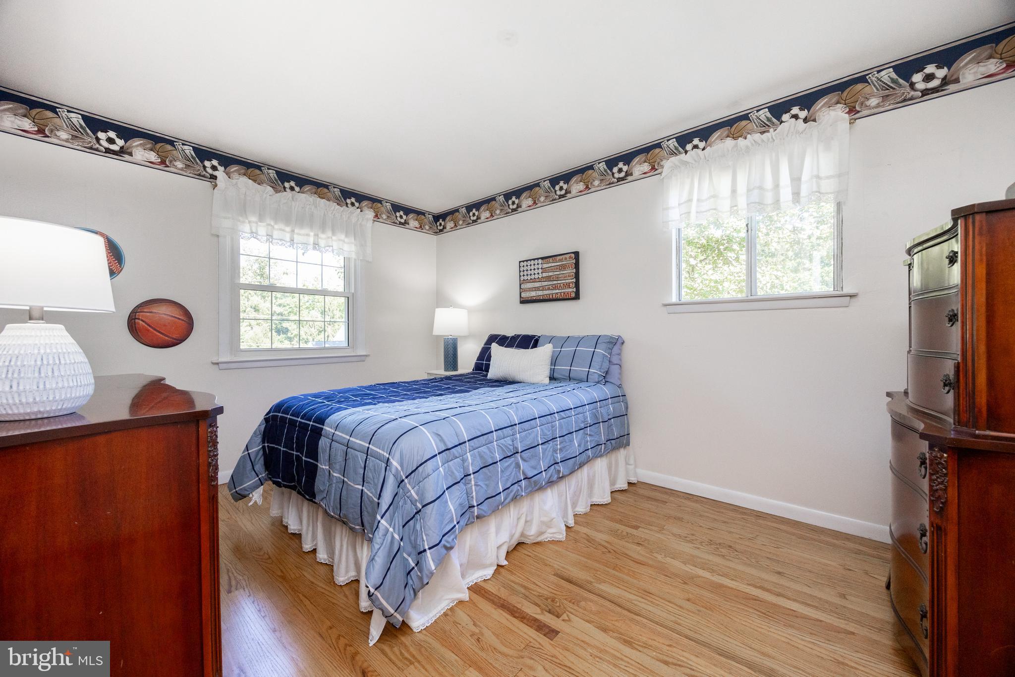 402 Concord Avenue Exton, PA 19341 - Photo 22 of 39 a bedroom with a bed window and dresser