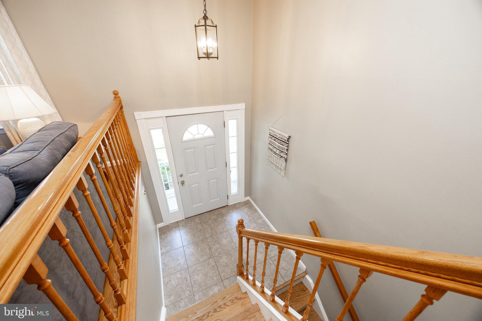 402 Concord Avenue Exton, PA 19341 - Photo 26 of 39 a view of staircase with railing and white walls