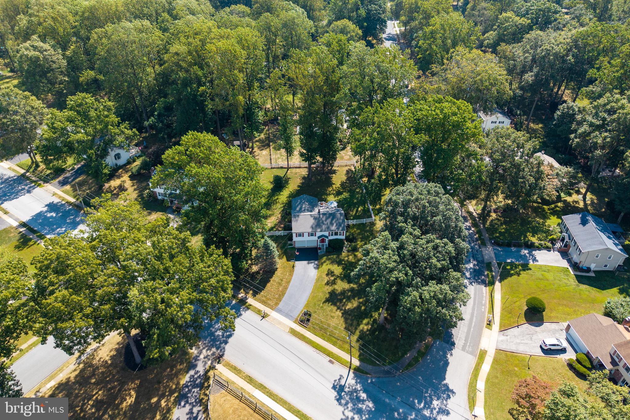 402 Concord Avenue Exton, PA 19341 - Photo 31 of 39 an aerial view of a house with a yard and garden