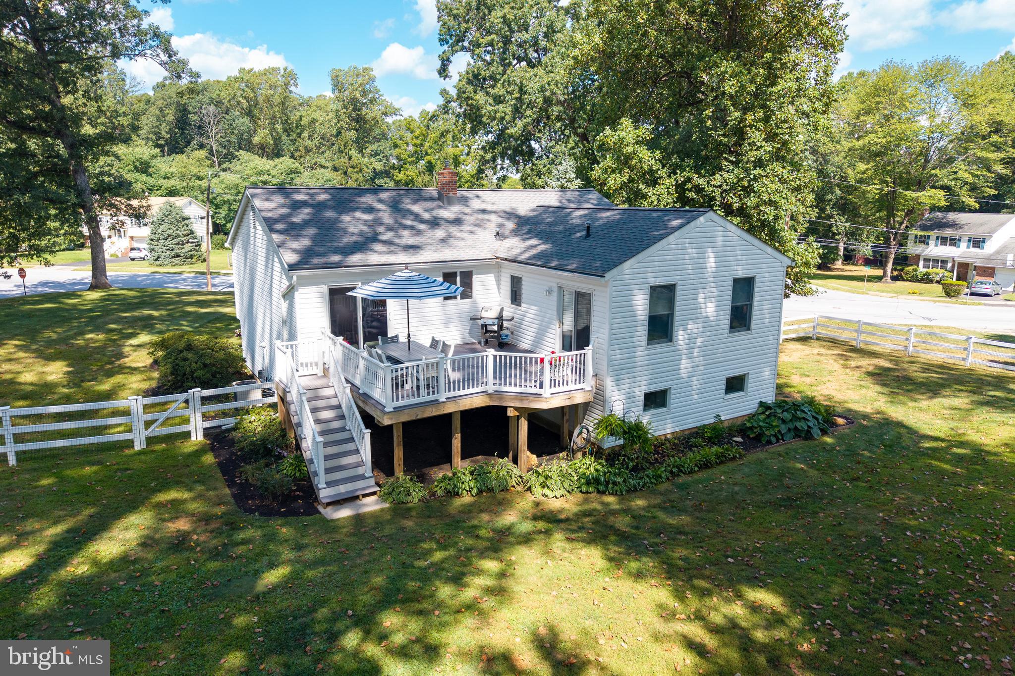 402 Concord Avenue Exton, PA 19341 - Photo 4 of 39 a front view of a house with garden