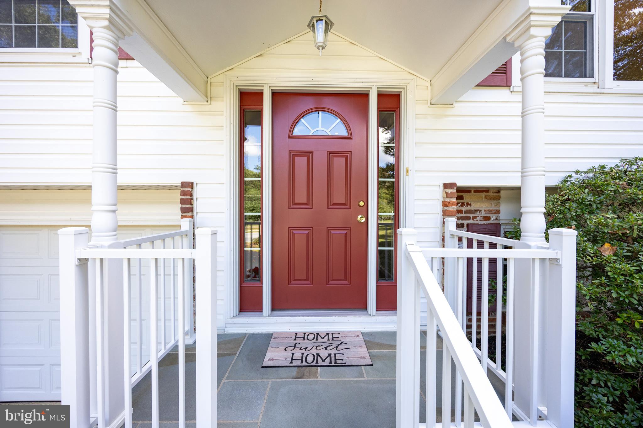 402 Concord Avenue Exton, PA 19341 - Photo 6 of 39 a front view of a house with a porch