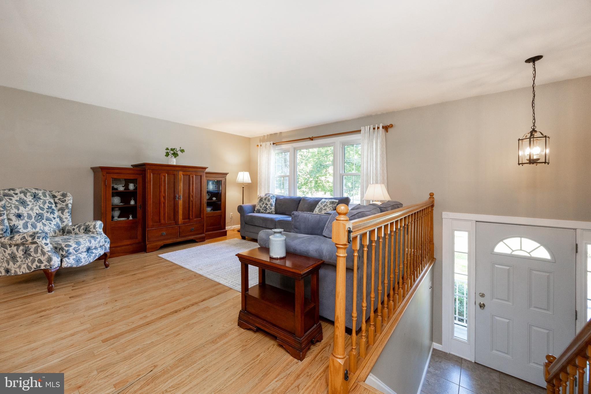 402 Concord Avenue Exton, PA 19341 - Photo 7 of 39 a living room with furniture and wooden floor