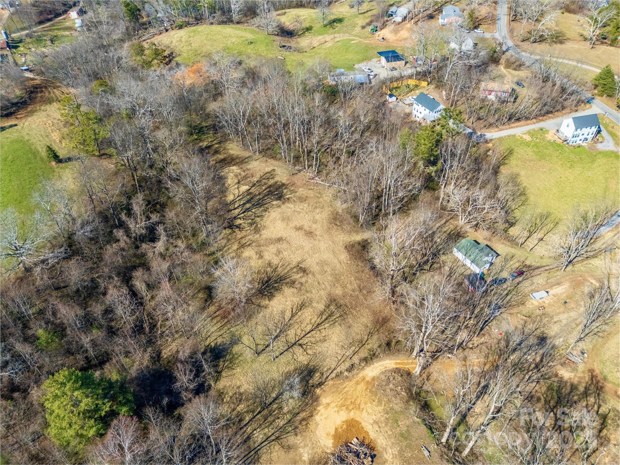 99999 Burney Mountain Road Fletcher, NC 28732 - Photo 21 of 36 a view of a yard with swimming pool