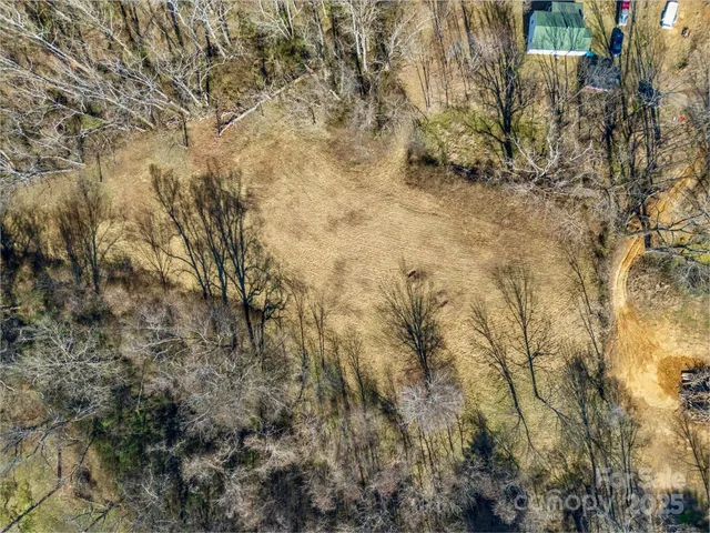 a view of yard covered with snow