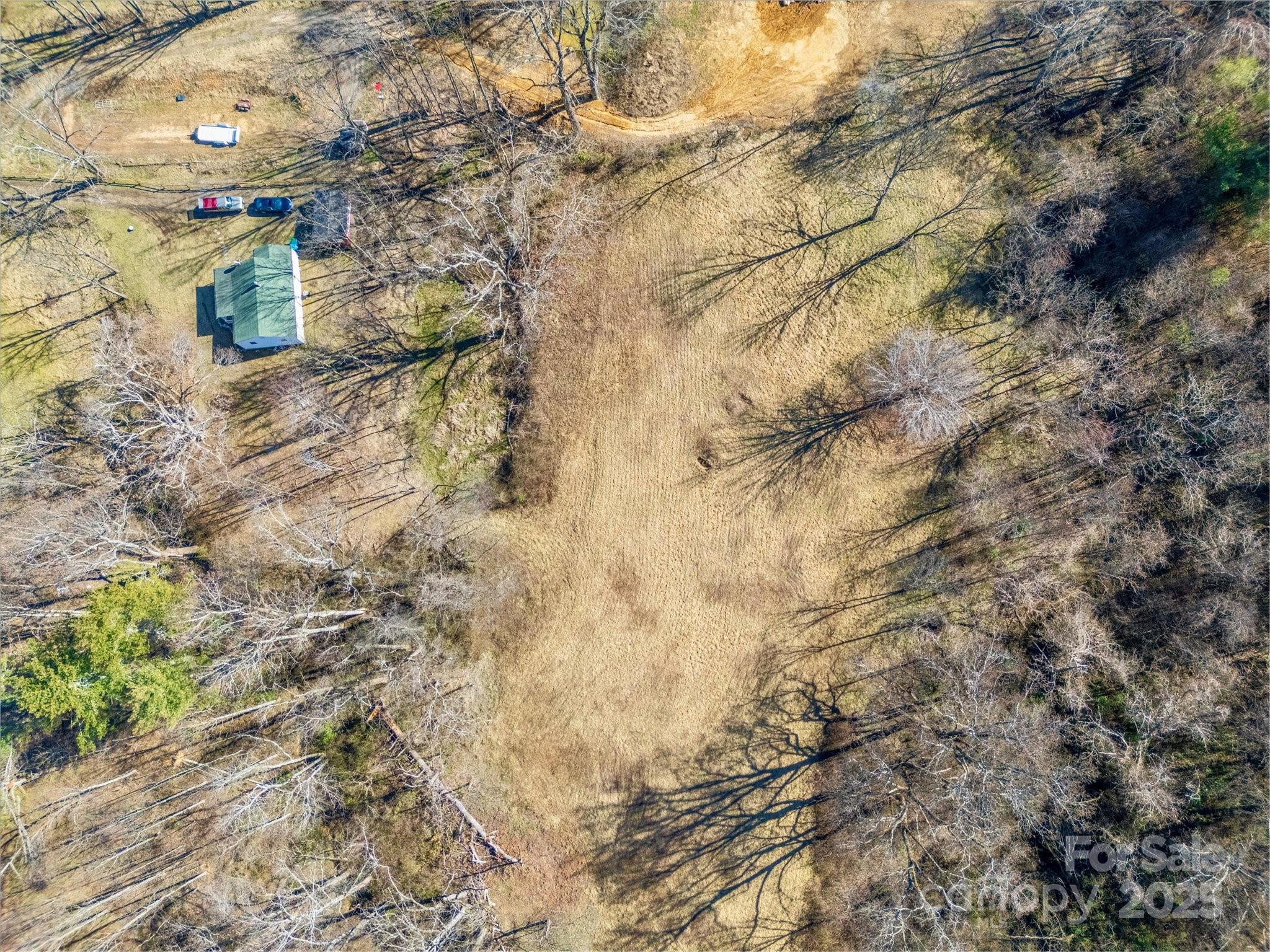 99999 Burney Mountain Road Fletcher, NC 28732 - Photo 34 of 36 a aerial view of a house with a yard