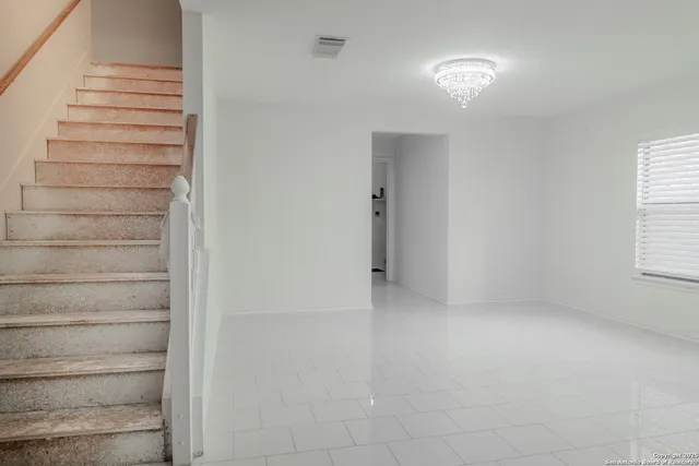 a view of entryway with stairs