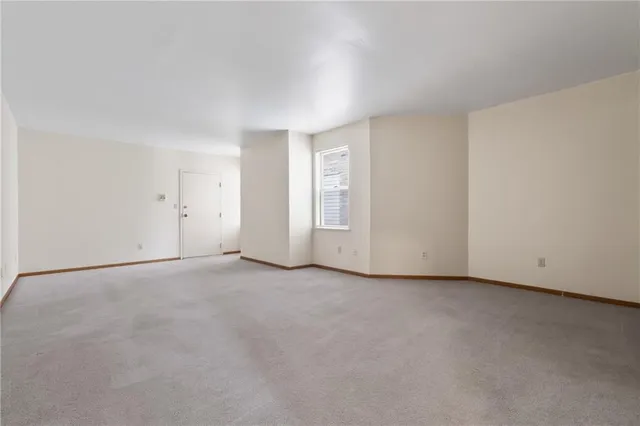 a kitchen with a stove and a refrigerator