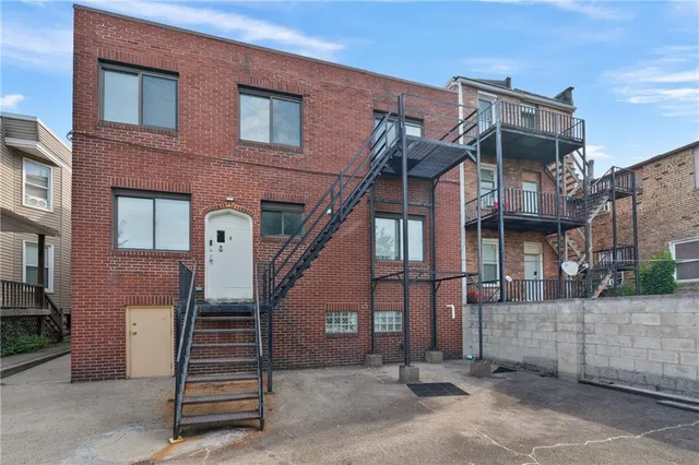 a front view of a house with a glass door
