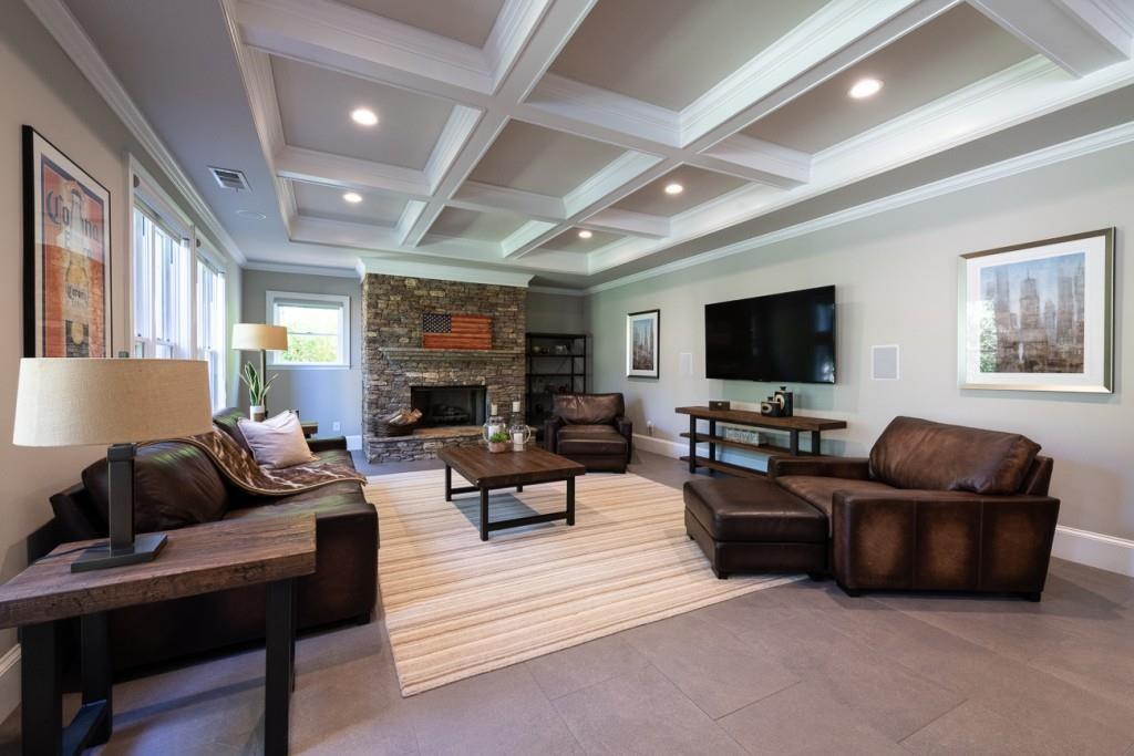 165 Autry Trail Alpharetta, GA 30022 - Photo 46 of 70 a living room with furniture and a flat screen tv