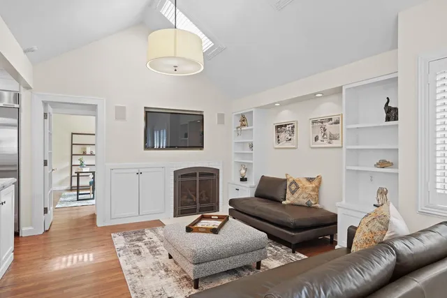 a bedroom with a bed and with a mirror