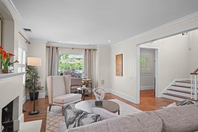a kitchen with granite countertop a sink and a stove